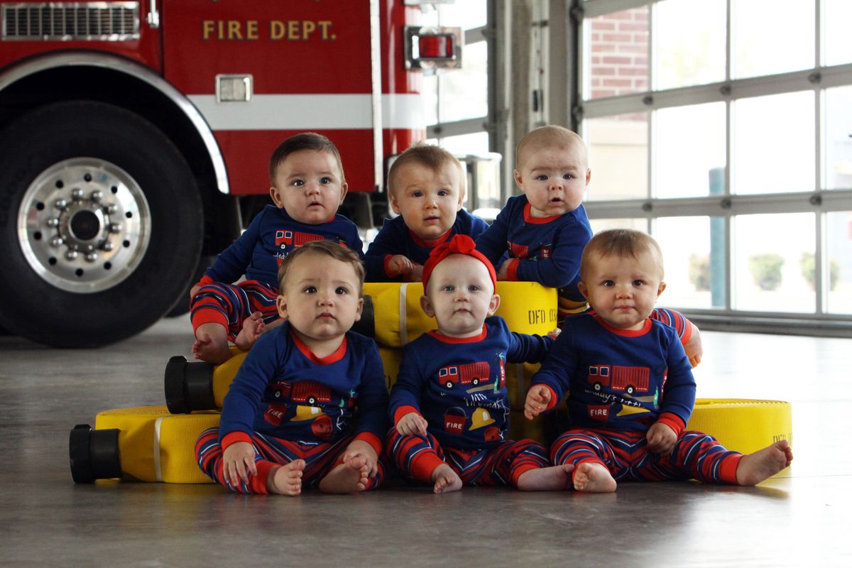 Fire station Christmas card features 6 super cute firefighter's babies 